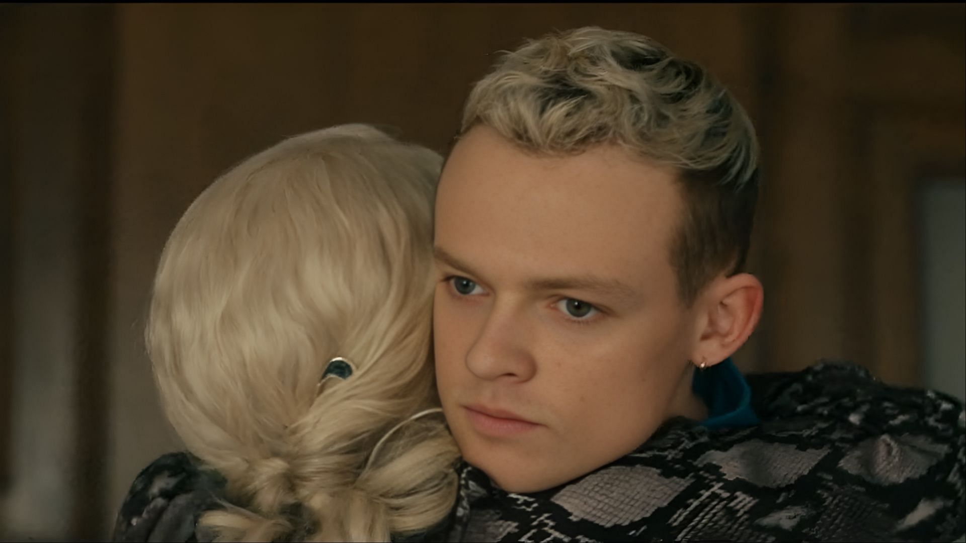Eddie embraces Maeve, but the distance in his eyes says everything — loyalty or manipulation? (Image via Paramount+)